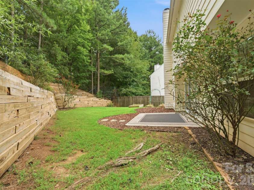 14339 Crown Harbor Drive, Charlotte, NC 28278.  MLS# CAR4415529, YatesRealty ID 9547. Private Wooded Backyard