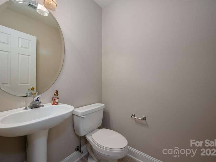 2412 Laura Drive, Charlotte, NC 28212.  MLS# CAR4249172, YatesRealty ID 9547. Half bath