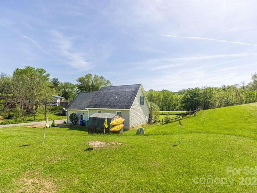 122 Ramsey Road, Asheville, NC 28806.  MLS# CAR4233927, YatesRealty ID 9551. Large and level back yard.