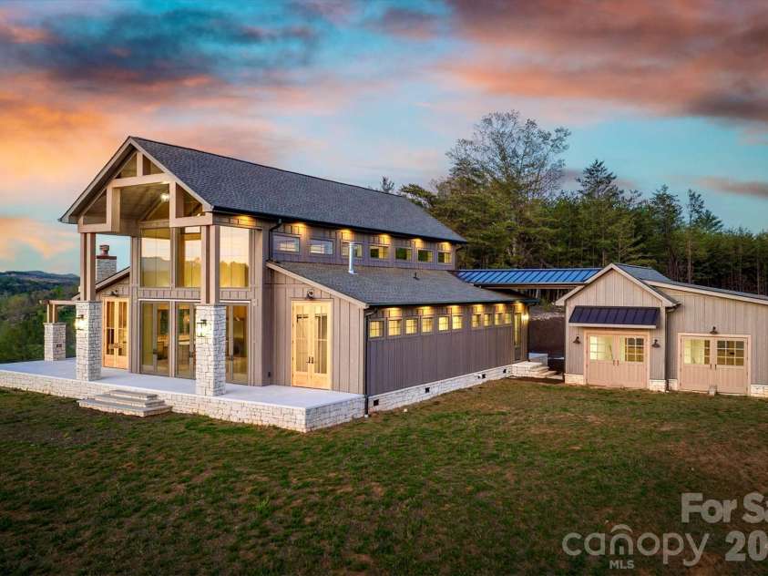 2013 Hitching Post Trail, Lenoir, NC 28645.  MLS# CAR4239009, YatesRealty ID 9552. Striking gable truss supported by timber and stone columns