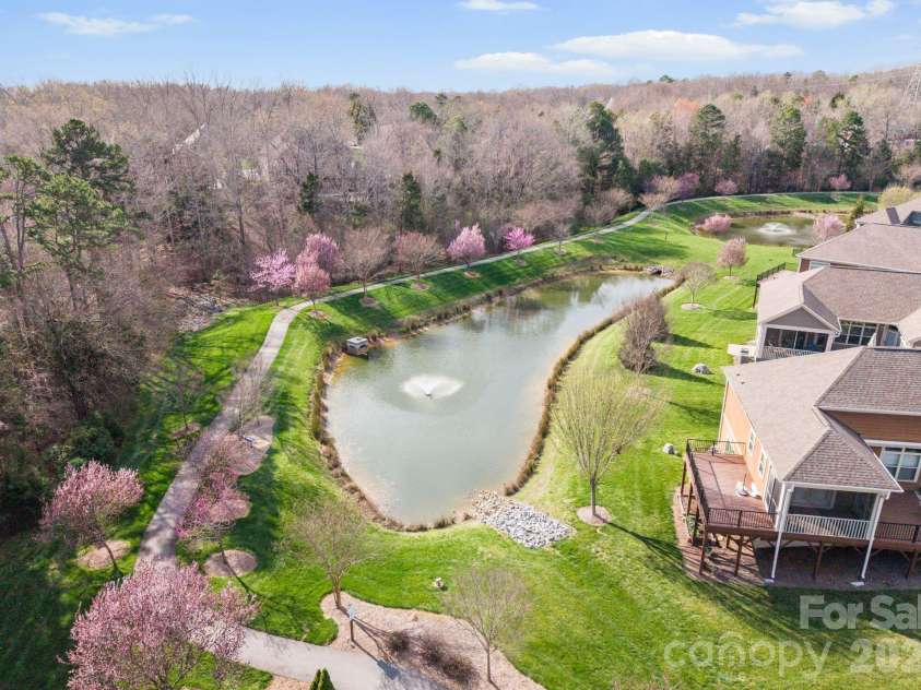 1230 Restoration Drive, Waxhaw, NC 28173.  MLS# CAR4353348, YatesRealty ID 9569. Community Pond