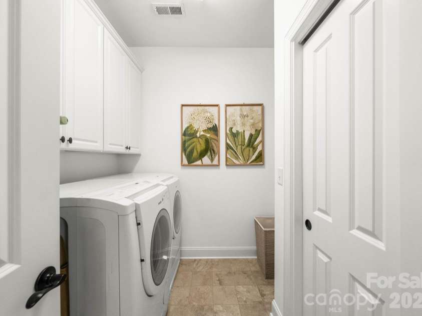 1230 Restoration Drive, Waxhaw, NC 28173.  MLS# CAR4353348, YatesRealty ID 9569. Laundry Room with Sink