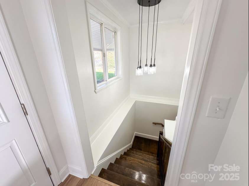 1003 4th Avenue, Gastonia, NC 28052.  MLS# CAR4216864, YatesRealty ID 9570. Stairs to Finished Basement