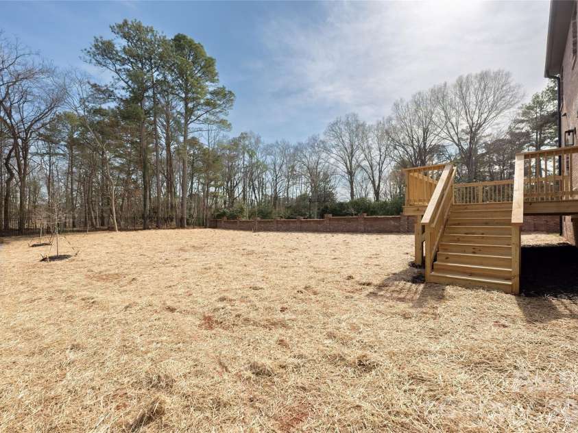100 Brackenbury Lane, Charlotte, NC 28270.  MLS# CAR4352384, YatesRealty ID 9578. Backyard. 