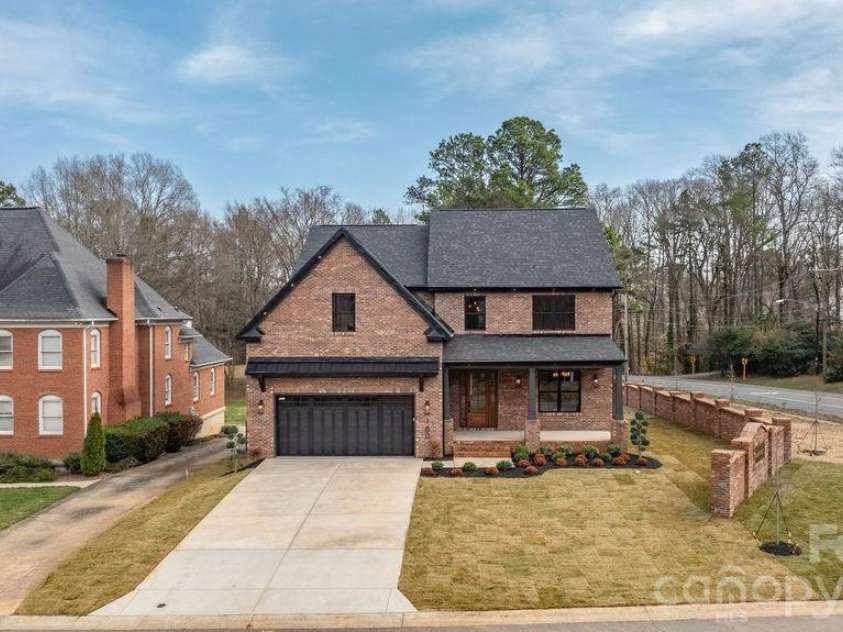 100 Brackenbury Lane, Charlotte, NC 28270.  MLS# CAR4352384, YatesRealty ID 9578. Front view. 