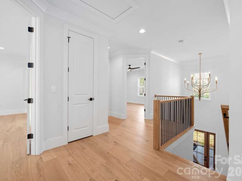 100 Brackenbury Lane, Charlotte, NC 28270.  MLS# CAR4352384, YatesRealty ID 9578. Upper level hallway.