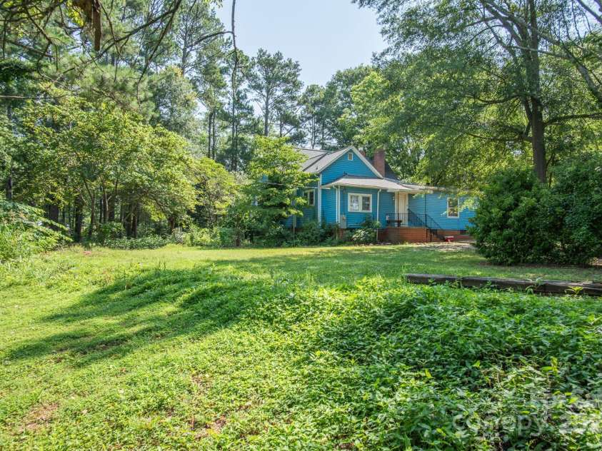 109 Fulton Street, Kings Mountain, NC 28086.  MLS# CAR4289026, YatesRealty ID 958. Back of Fulton St home looking from 1.2 AC Vacant Lot