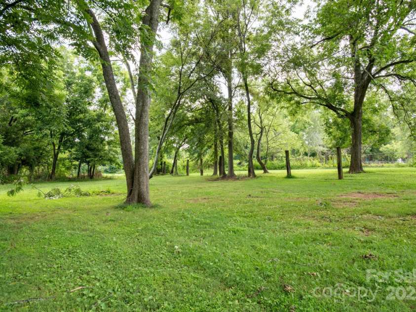 109 Fulton Street, Kings Mountain, NC 28086.  MLS# CAR4289026, YatesRealty ID 958. Backyard of Walker St homes looking towards 1.2 AC Vacant Lot
