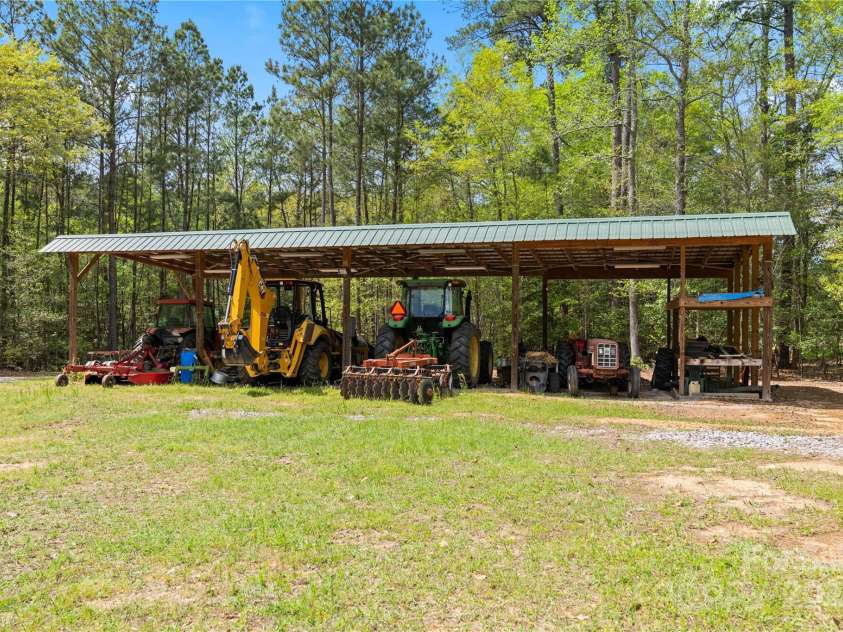 229 Joseph Kershaw Road, Eastover, SC 29044.  MLS# CAR4122309, YatesRealty ID 958. Equipment Storage, all equipment needed to maintain the property is included, list available