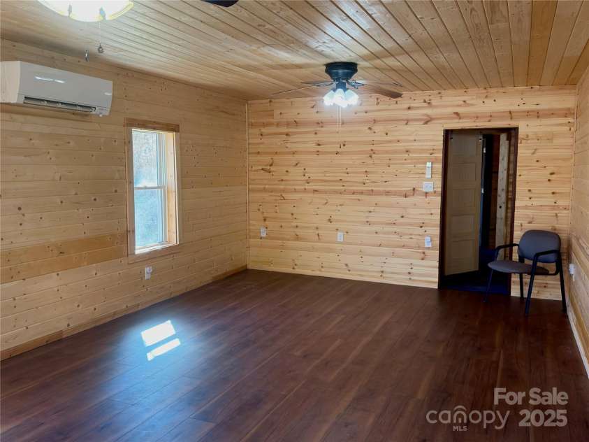 55 Summit View Drive, Marshall, NC 28753.  MLS# CAR4237579, YatesRealty ID 9581. Living room from front door entrance