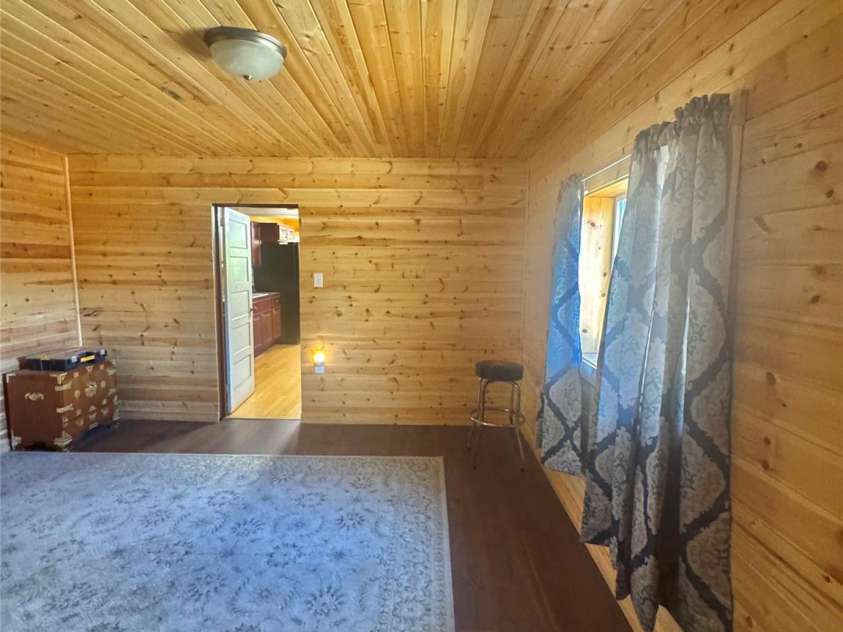 55 Summit View Drive, Marshall, NC 28753.  MLS# CAR4237579, YatesRealty ID 9581. Main bedroom looking toward kichen