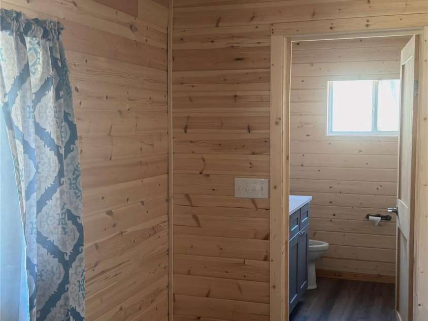 55 Summit View Drive, Marshall, NC 28753.  MLS# CAR4237579, YatesRealty ID 9581. Main bedroom toward bath