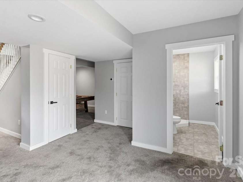 9 Old Amber Drive, Weaverville, NC 28787.  MLS# CAR4320794, YatesRealty ID 9583. Basement Bathroom