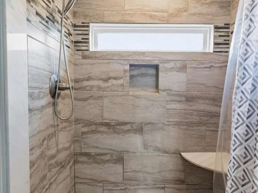 9 Old Amber Drive, Weaverville, NC 28787.  MLS# CAR4320794, YatesRealty ID 9583. Main Bathroom with Seating