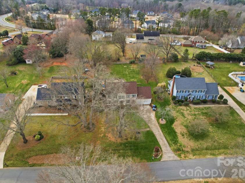 8917 Dartmoor Place, Mint Hill, NC 28227.  MLS# CAR4352305, YatesRealty ID 9587. Drone 4
