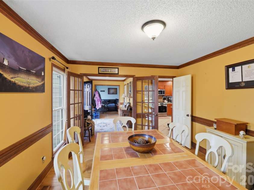 8917 Dartmoor Place, Mint Hill, NC 28227.  MLS# CAR4352305, YatesRealty ID 9587. Formal Dining Room