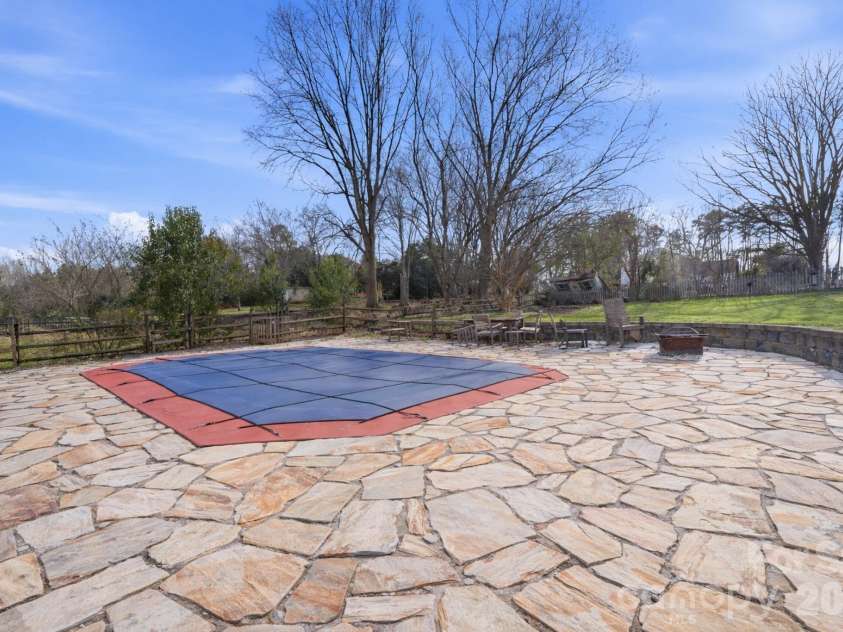 8917 Dartmoor Place, Mint Hill, NC 28227.  MLS# CAR4352305, YatesRealty ID 9587. Pool/Pavers