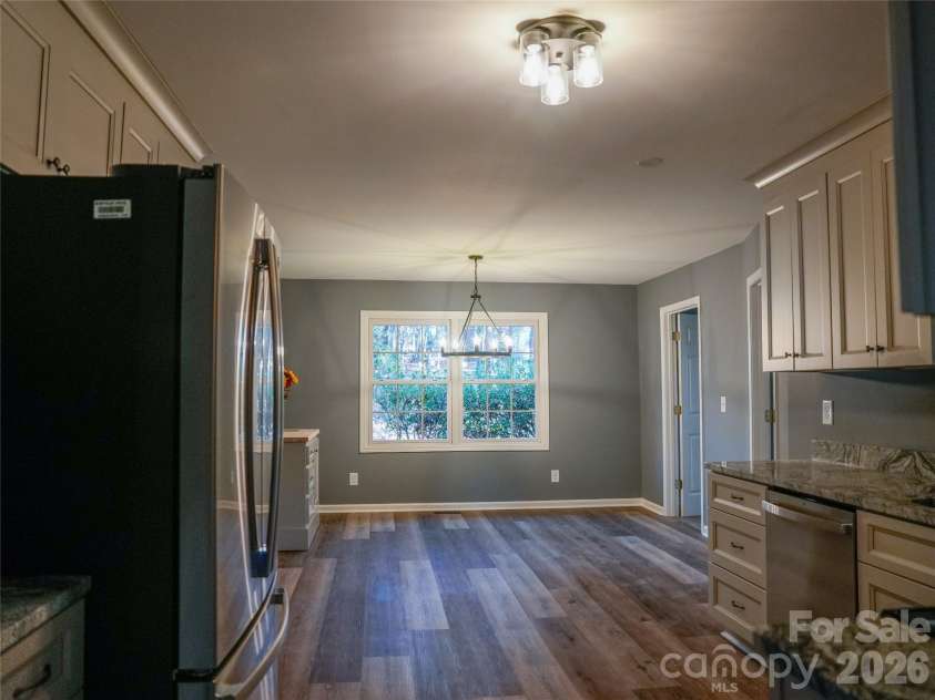 44585 Baldwin Road, New London, NC 28127.  MLS# CAR4323021, YatesRealty ID 9591. Kitchen opens up to dining/breakfast/sitting area