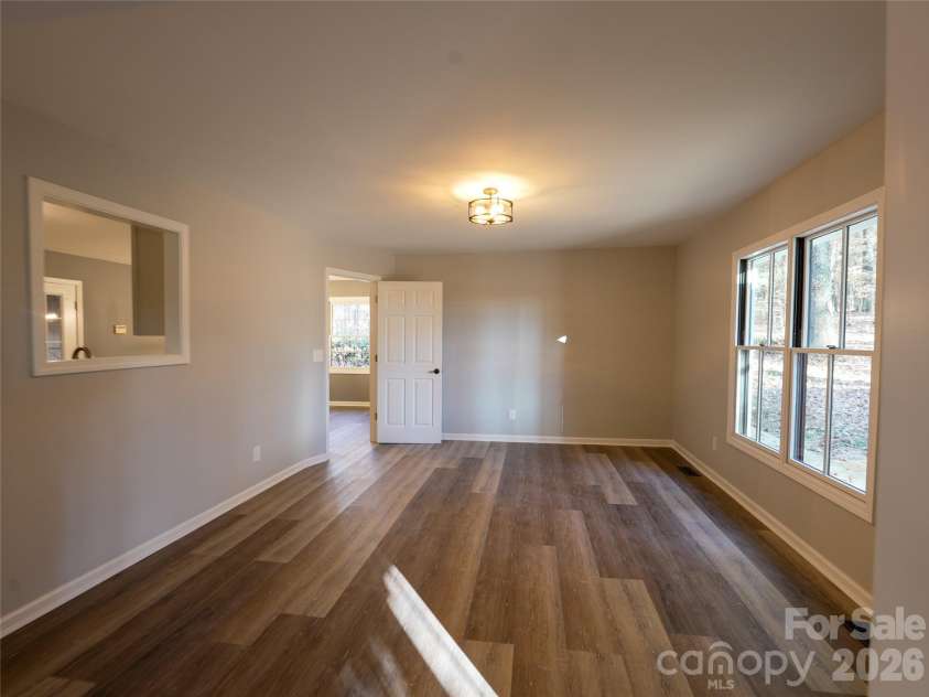 44585 Baldwin Road, New London, NC 28127.  MLS# CAR4323021, YatesRealty ID 9591. Pass through window from kitchen to formal dining room/office