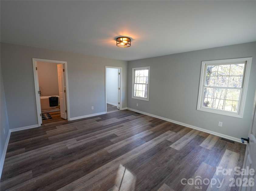 44585 Baldwin Road, New London, NC 28127.  MLS# CAR4323021, YatesRealty ID 9591. Primary bedroom with ample natural light