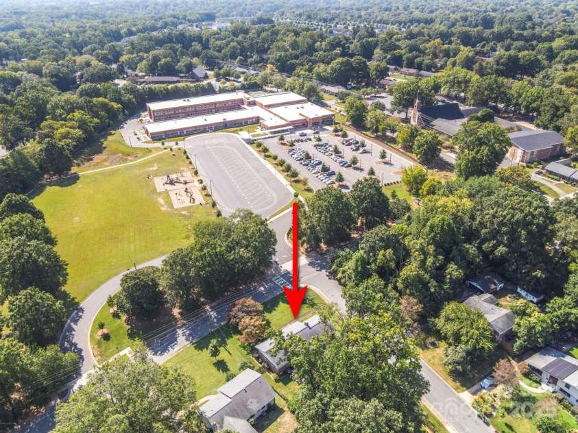 5748 Farmbrook Drive, Charlotte, NC 28210.  MLS# CAR4302947, YatesRealty ID 9592. Aerial View of Home with proximity to school across street!