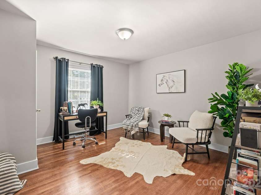5748 Farmbrook Drive, Charlotte, NC 28210.  MLS# CAR4302947, YatesRealty ID 9592. Spacious Secondary Bedroom with hardwood floors currently being used as an office!