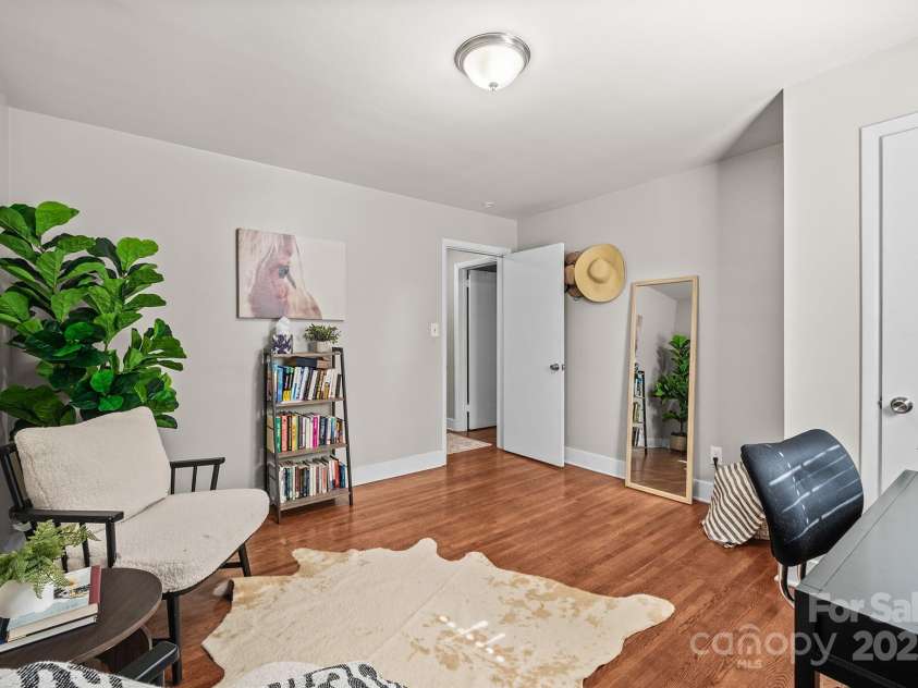 5748 Farmbrook Drive, Charlotte, NC 28210.  MLS# CAR4302947, YatesRealty ID 9592. Spacious Secondary Bedroom with hardwood floors currently being used as an office!