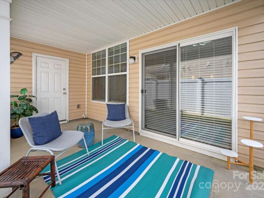 158 Council House Road, Fort Mill, SC 29708.  MLS# CAR4239888, YatesRealty ID 9596. Glass sliding doors lead into living area