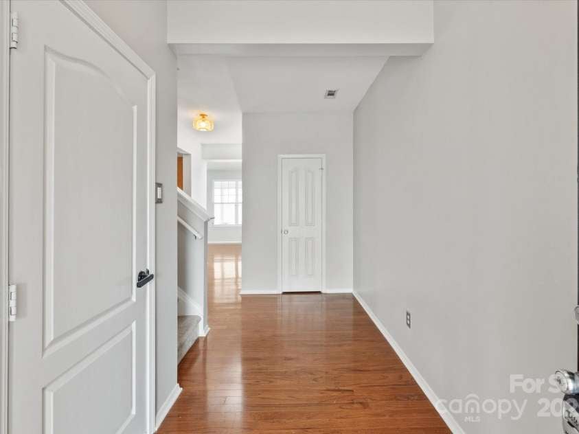 158 Council House Road, Fort Mill, SC 29708.  MLS# CAR4239888, YatesRealty ID 9596. Wide foyer with hardwoods throughout first floor
