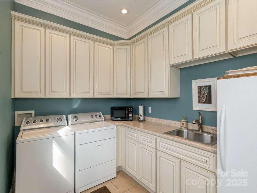 172 Summer Morning Court, Lake Lure, NC 28746.  MLS# CAR4223102, YatesRealty ID 960. Laundry room -Main Level