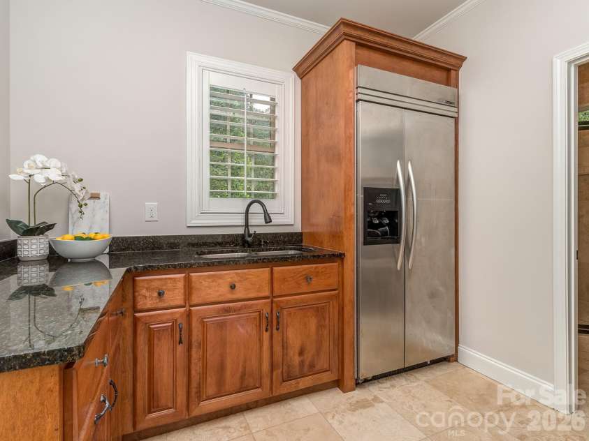 8208 Wingard Road, Waxhaw, NC 28173.  MLS# CAR4289721, YatesRealty ID 9601. Pool House Kitchen