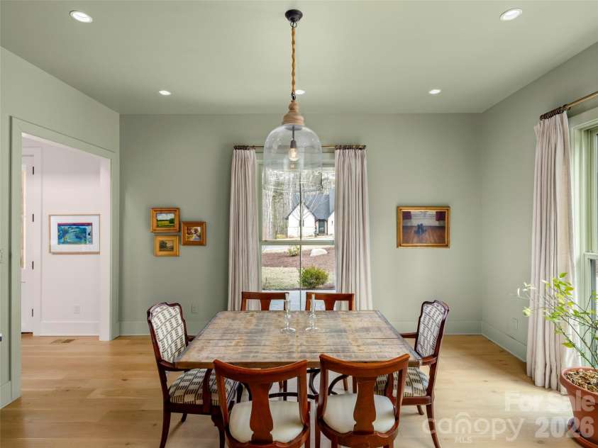 206 Kelmscott Lane, Asheville, NC 28803.  MLS# CAR4343948, YatesRealty ID 9604. Dining room with extra large windows for light