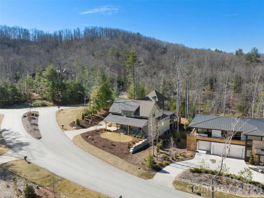 206 Kelmscott Lane, Asheville, NC 28803.  MLS# CAR4343948, YatesRealty ID 9604. Large boulder wall securing side of front yard