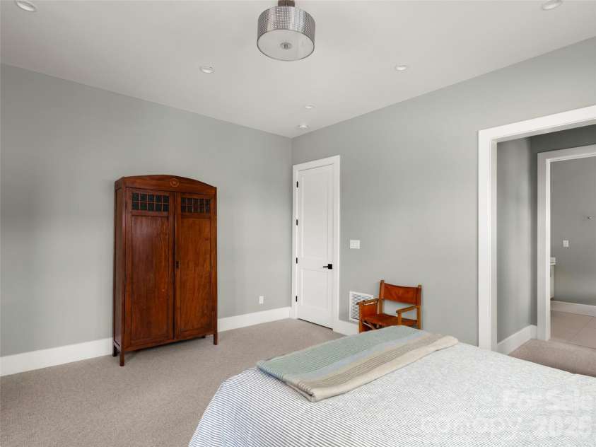 206 Kelmscott Lane, Asheville, NC 28803.  MLS# CAR4343948, YatesRealty ID 9604. Spacious primary bedroom