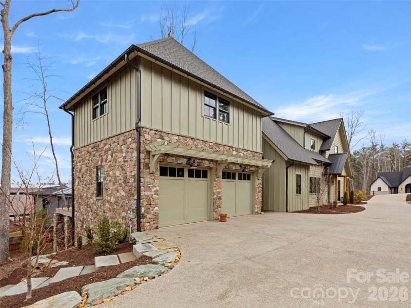 206 Kelmscott Lane, Asheville, NC 28803.  MLS# CAR4343948, YatesRealty ID 9604. Two car garage with upper studio and lower basement