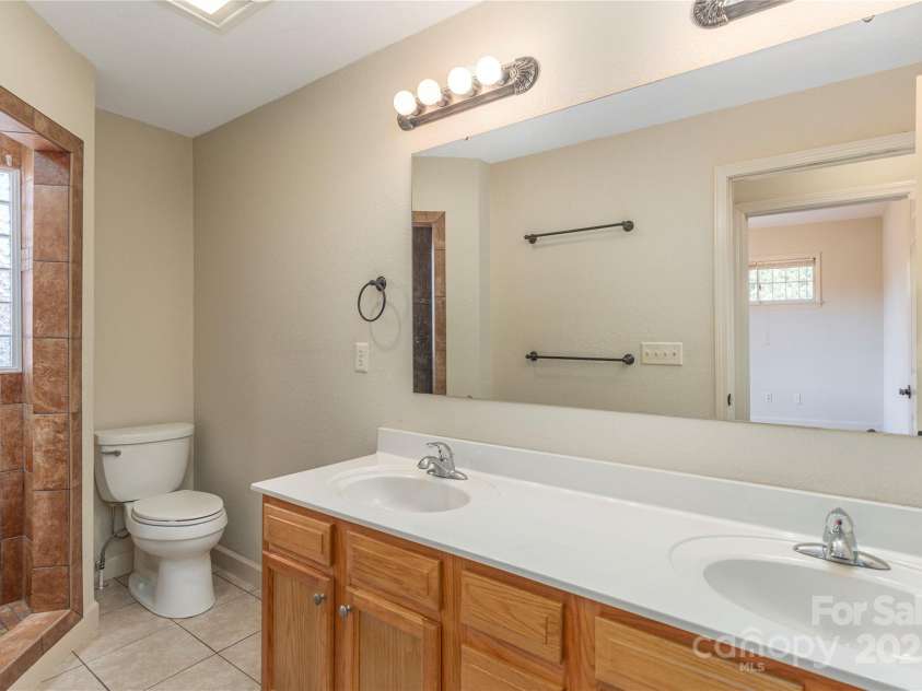 114/116 Arco Road, Asheville, NC 28805.  MLS# CAR4227410, YatesRealty ID 9606. Left side- bath