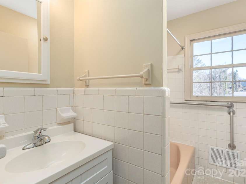 114/116 Arco Road, Asheville, NC 28805.  MLS# CAR4227410, YatesRealty ID 9606. Right side- bath