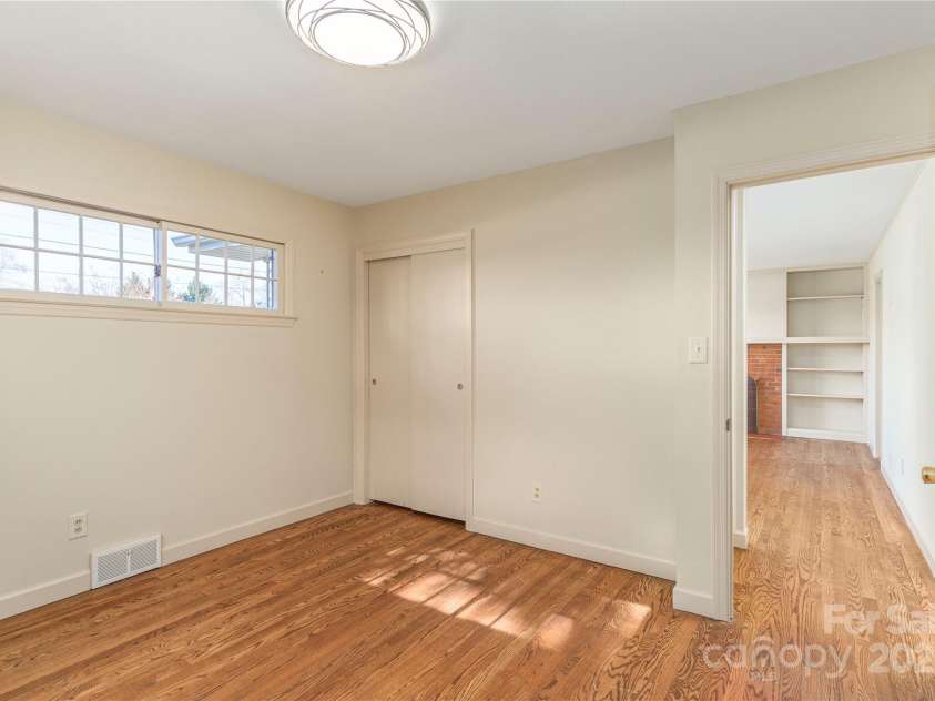 114/116 Arco Road, Asheville, NC 28805.  MLS# CAR4227410, YatesRealty ID 9606. Right side- Front bedroom