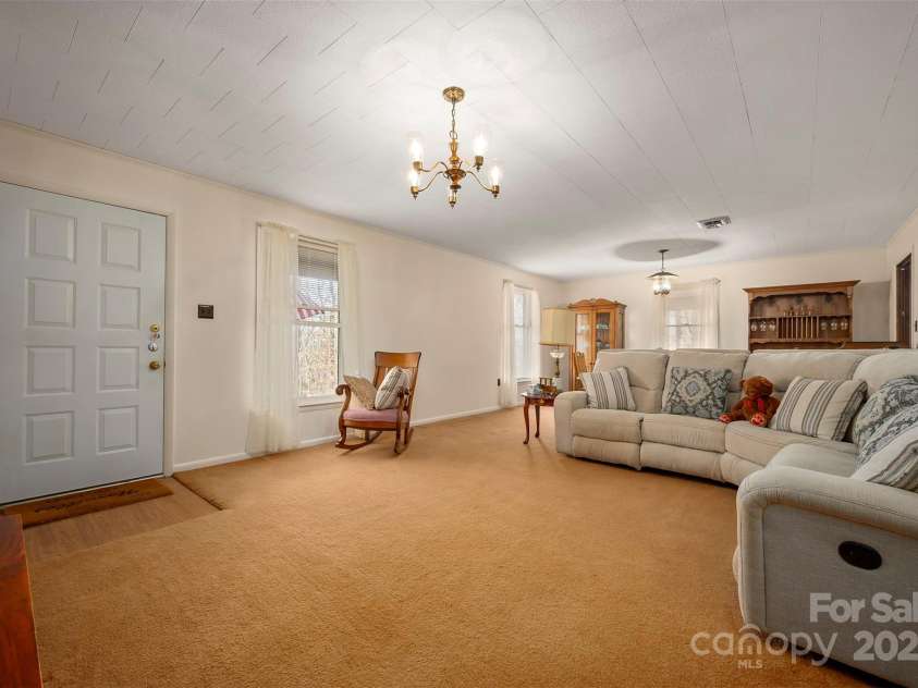 582 County Line Road, Rutherfordton, NC 28139.  MLS# CAR4235377, YatesRealty ID 9609. Living room open to dining room
