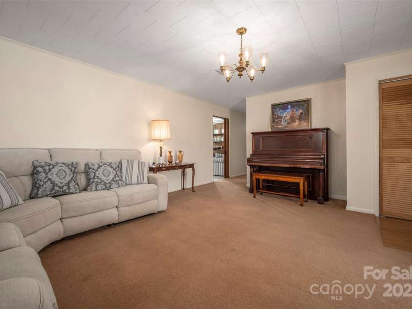 582 County Line Road, Rutherfordton, NC 28139.  MLS# CAR4235377, YatesRealty ID 9609. Living room/dining room