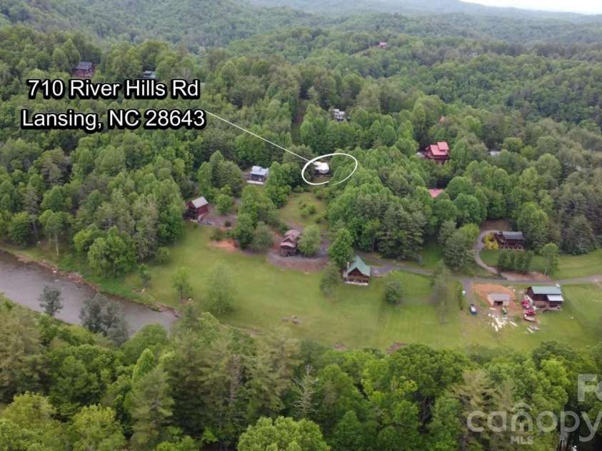 710 River Hills Road, Lansing, NC 28643.  MLS# CAR4267689, YatesRealty ID 9609. 