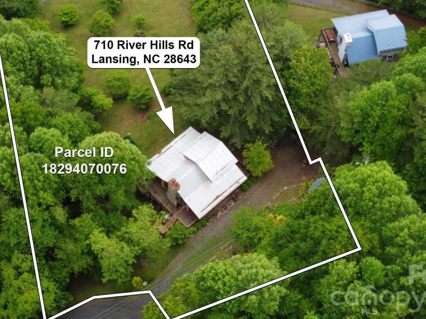 710 River Hills Road, Lansing, NC 28643.  MLS# CAR4267689, YatesRealty ID 9609. 