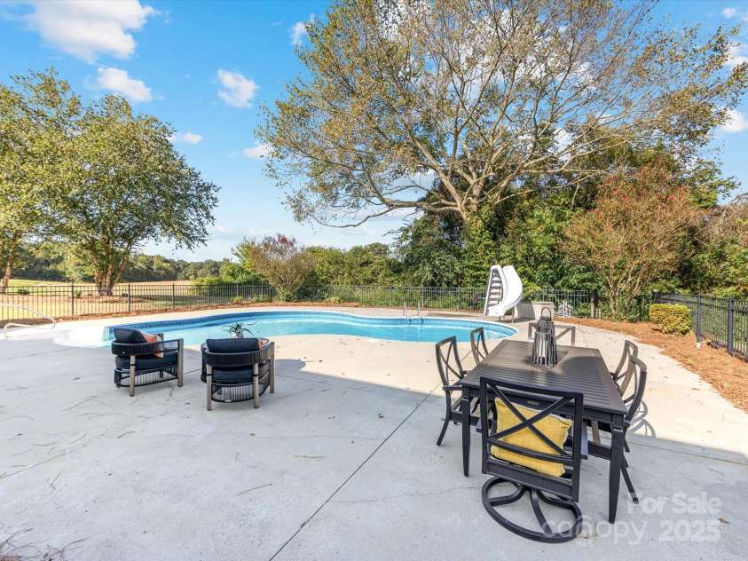 2820 Smith Field Drive, Monroe, NC 28110.  MLS# CAR4303716, YatesRealty ID 961. Pool Patio