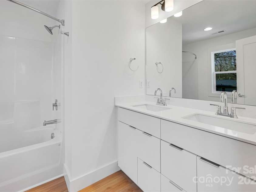 6 Cub Road, Asheville, NC 28806.  MLS# CAR4239054, YatesRealty ID 9610. Interior of completed model for reference. Primary bathroom.