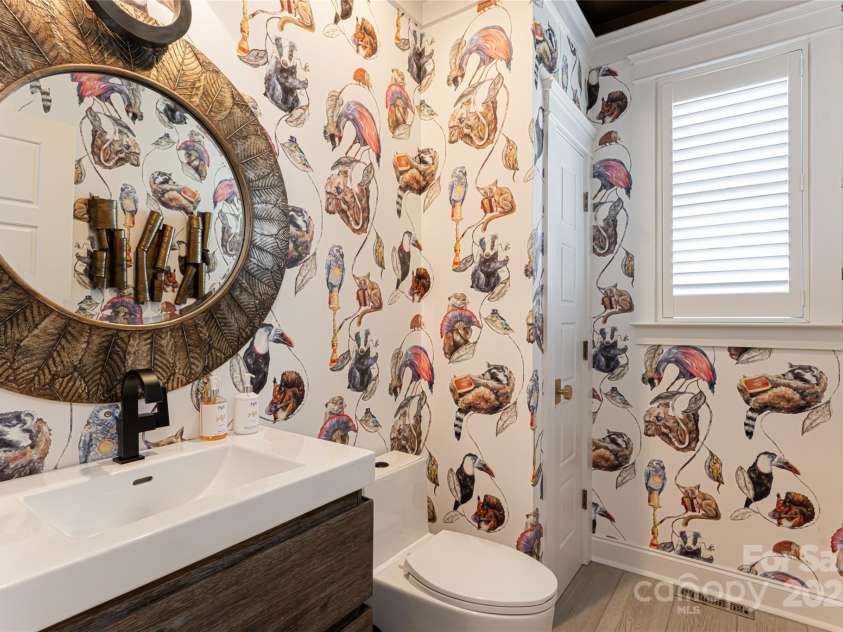 15 Dayflower Drive, Asheville, NC 28803.  MLS# CAR4209774, YatesRealty ID 9613. Main level half bath