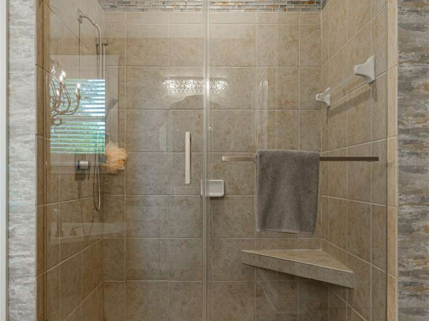 15 Dayflower Drive, Asheville, NC 28803.  MLS# CAR4209774, YatesRealty ID 9613. Spa like shower in ensuite bathroom