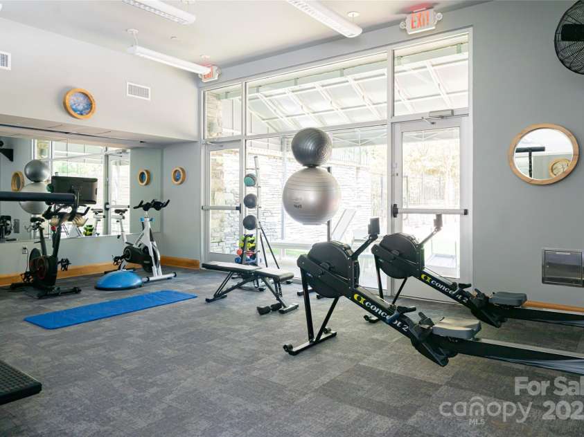 32 Ramble Way, Asheville, NC 28803.  MLS# CAR4251948, YatesRealty ID 9614. Living Well Center Workout Area