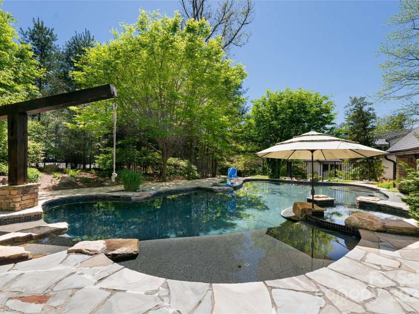 32 Ramble Way, Asheville, NC 28803.  MLS# CAR4251948, YatesRealty ID 9614. Pool and Rope-swing