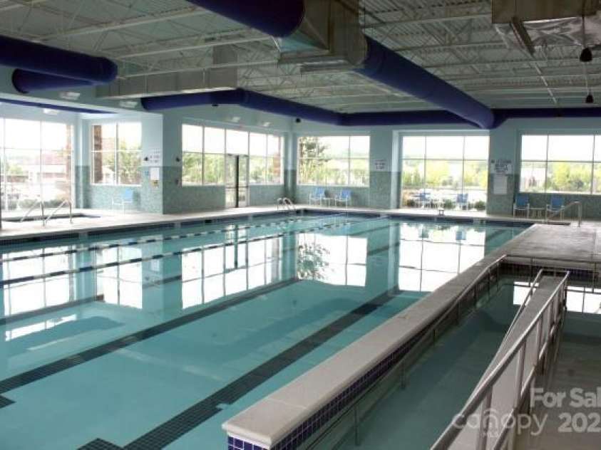 5011 Broad Lane, Fort Mill, SC 29707.  MLS# CAR4239090, YatesRealty ID 9615. Indoor Pool