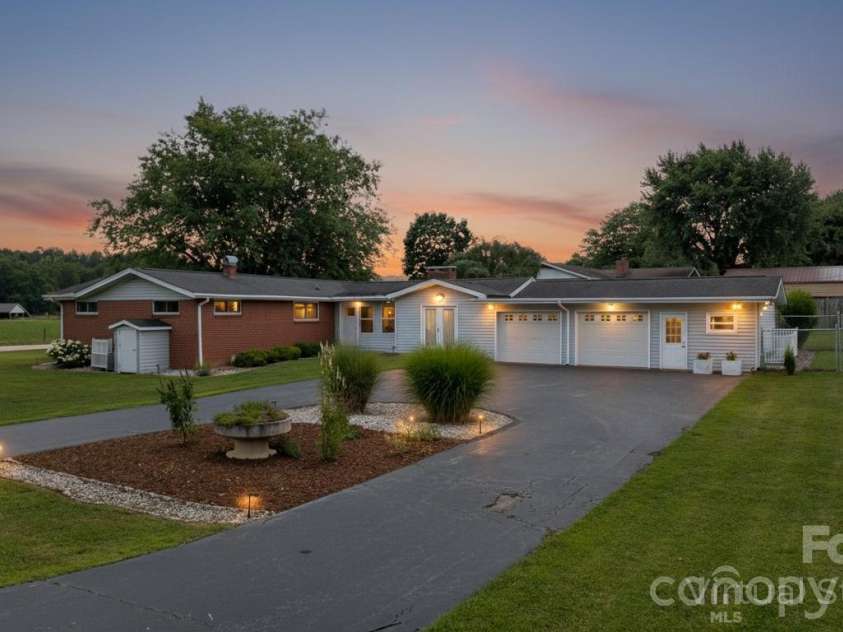 10 Moland Drive, Etowah, NC 28729.  MLS# CAR4352858, YatesRealty ID 9624. VIRTUALLY STAGED TWILIGHT